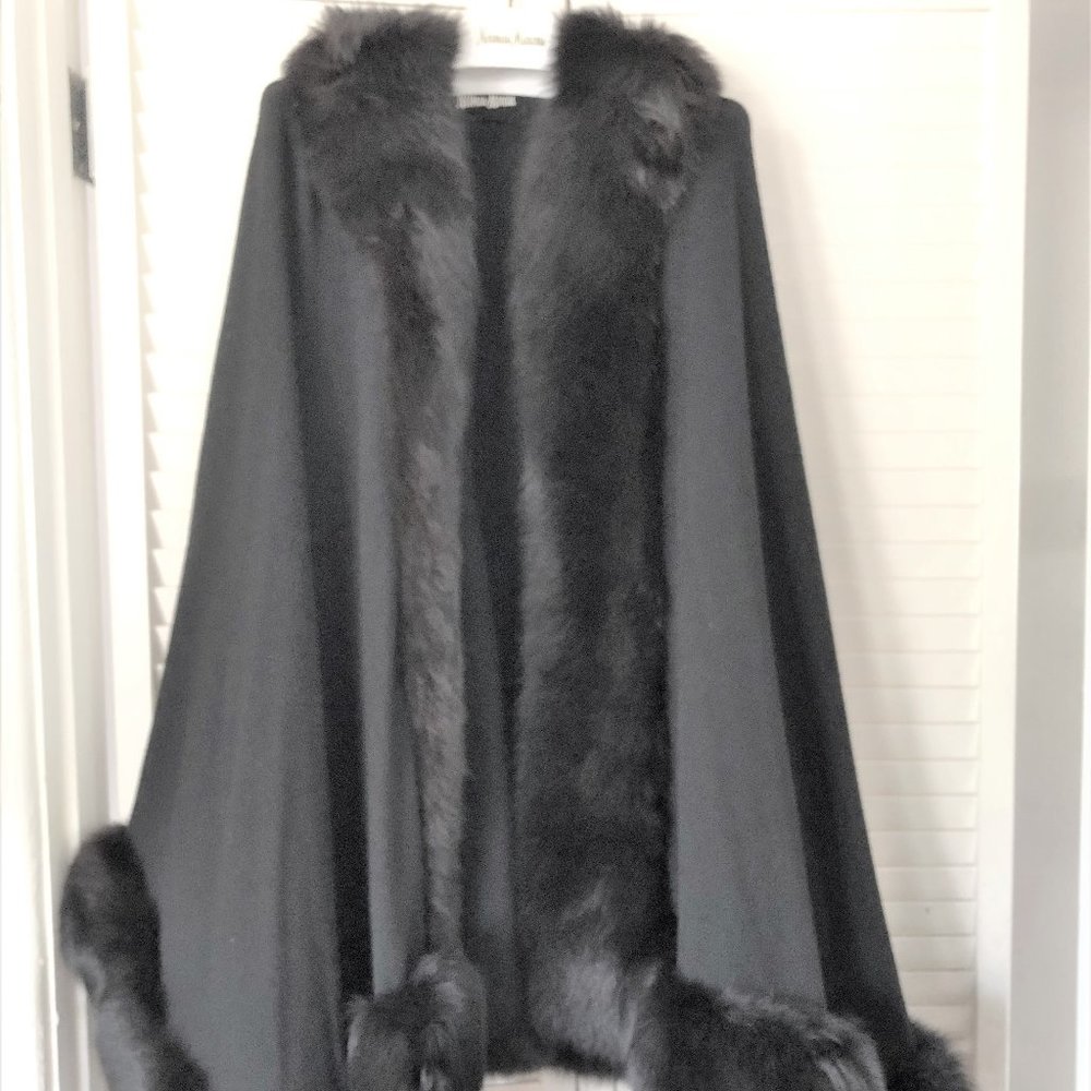 Fur-trimmed black wool cape from Neiman-Marcus
